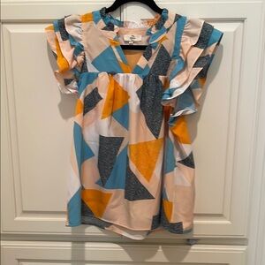 Women’s summer blouse with Flutter Sleeves.. Blouse in Peach, Teal blue